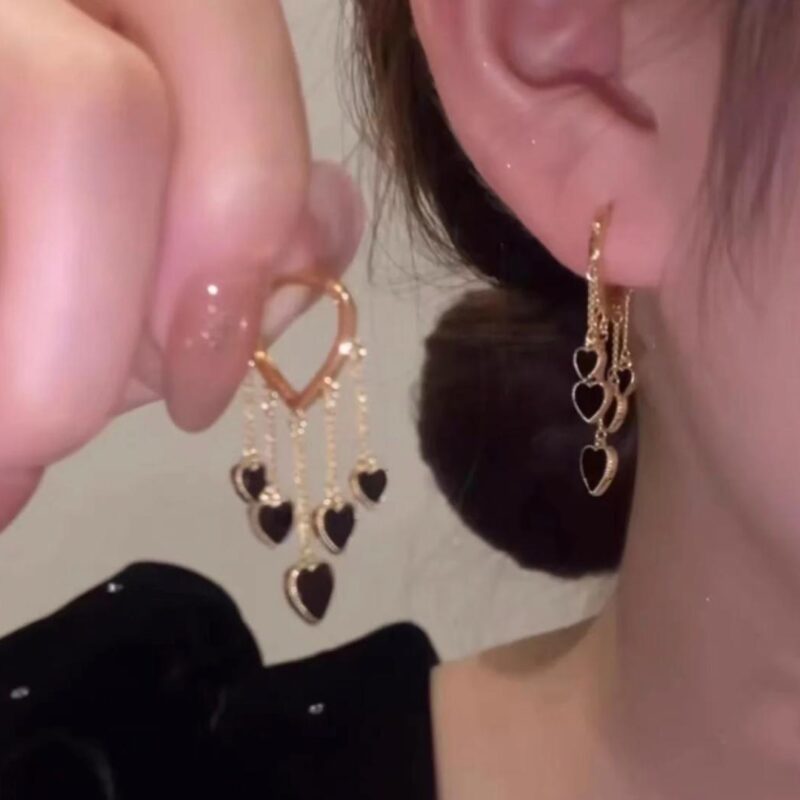 Gold and Black Heart Dangle Hoop Earrings. - Image 3