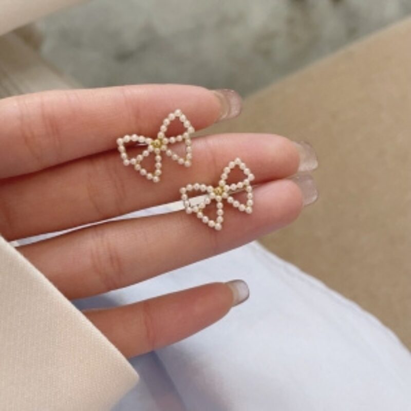 Pearl Bow Stud Earrings. - Image 2