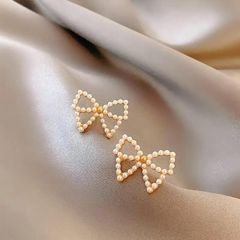 Pearl Bow Stud Earrings.