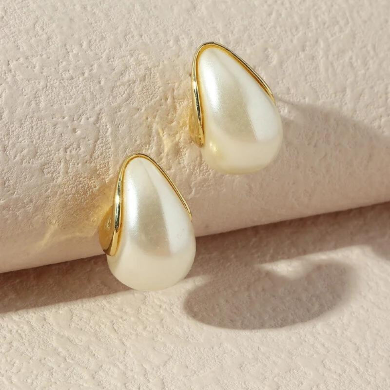 Gold-Toned Teardrop Pearl Earrings.