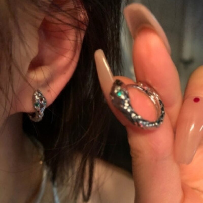 Silver-toned Snake Huggie Hoop Earrings with Green "Emerald" Eyes - Image 3