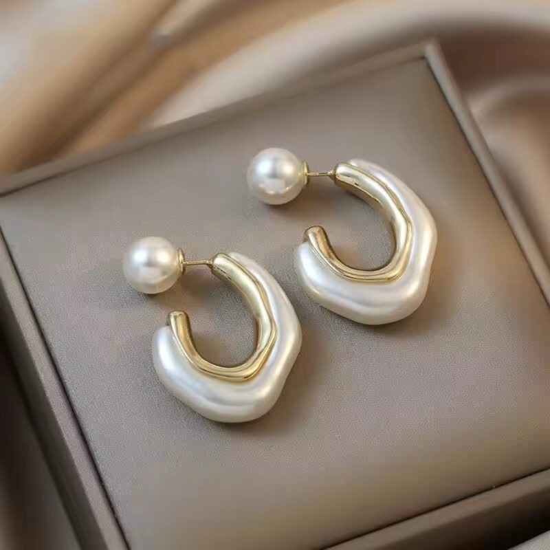 Contemporary U-shaped Pearl Half Hoop Earrings - Image 2