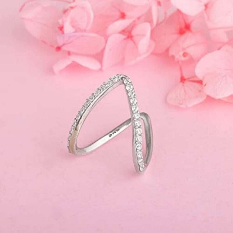 V-shaped ring adorned with cubic zirconia stones.