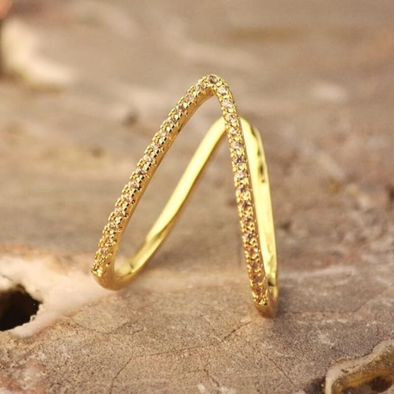 V-shaped ring adorned with cubic zirconia stones. - Image 3