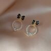 Glossed-Princess Bow Earrings.