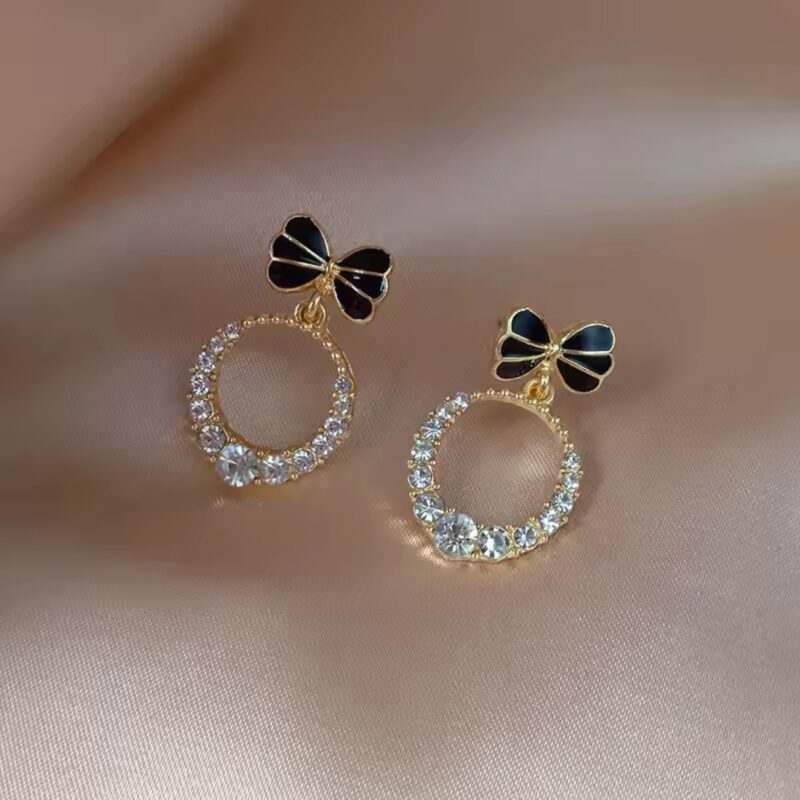 Glossed-Princess Bow Earrings.