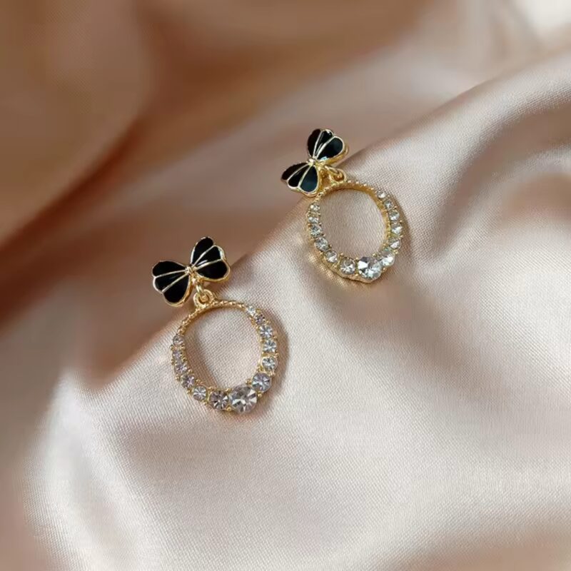 Glossed-Princess Bow Earrings. - Image 2