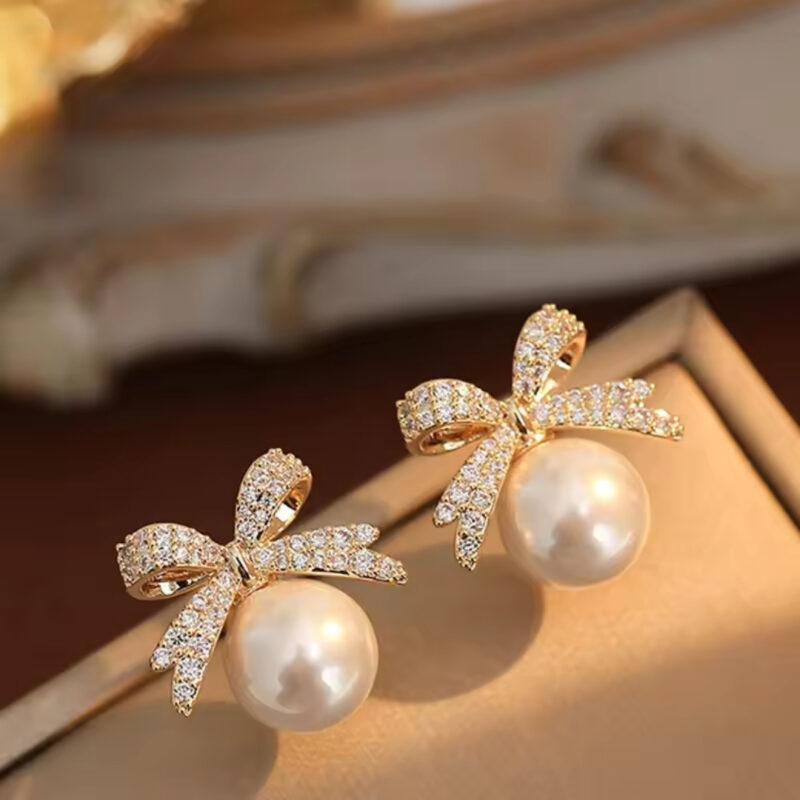 Bowknot Pearl Stud Earrings. - Image 2