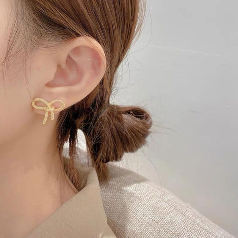 Gold Bow Knot Stud Earrings - Image 3