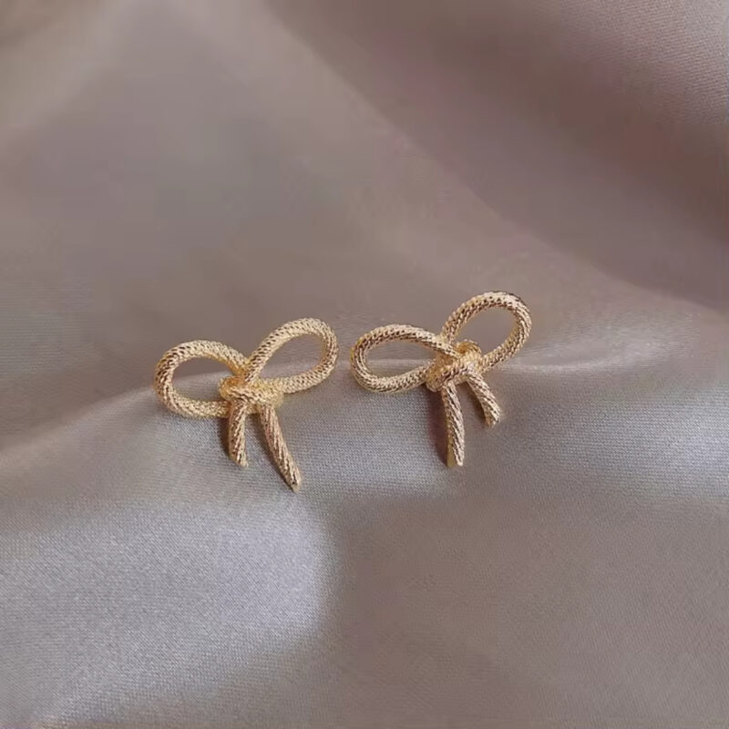 Gold Bow Knot Stud Earrings - Image 2