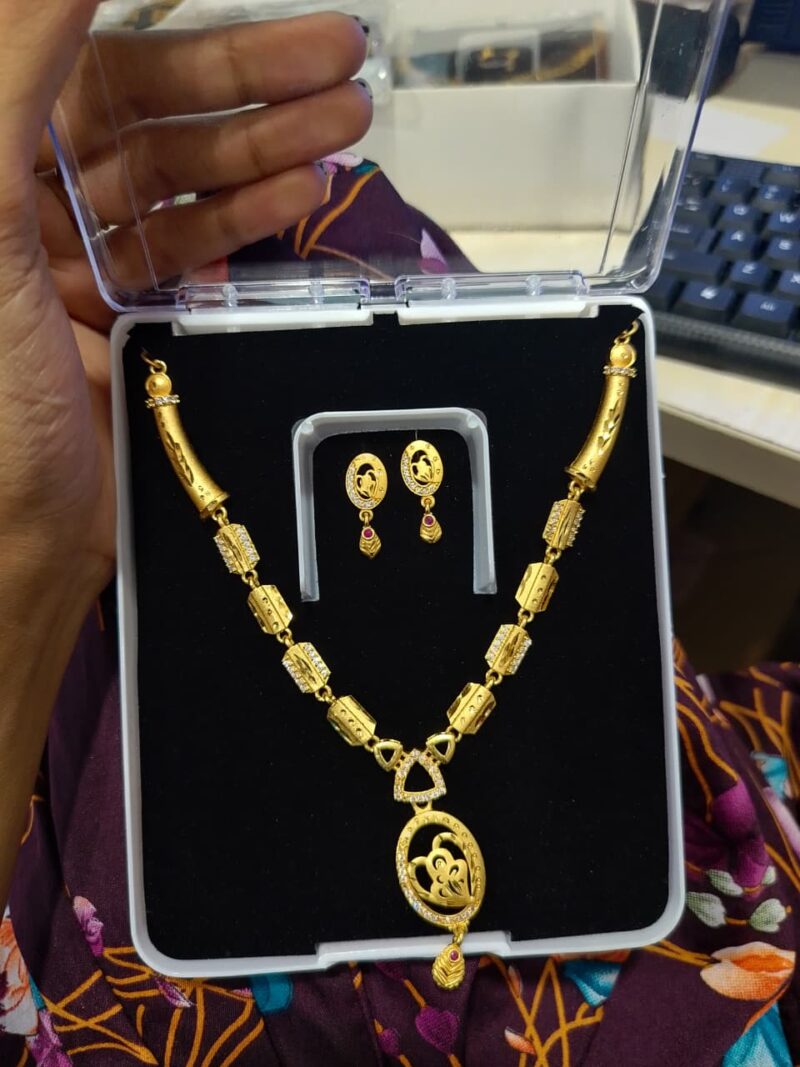 gold-plated necklace set with matching earrings,