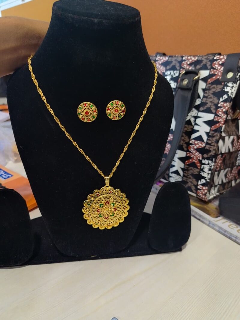 Gold Plated Sizzling Meenakari Locket Set with Chain and Earrings.