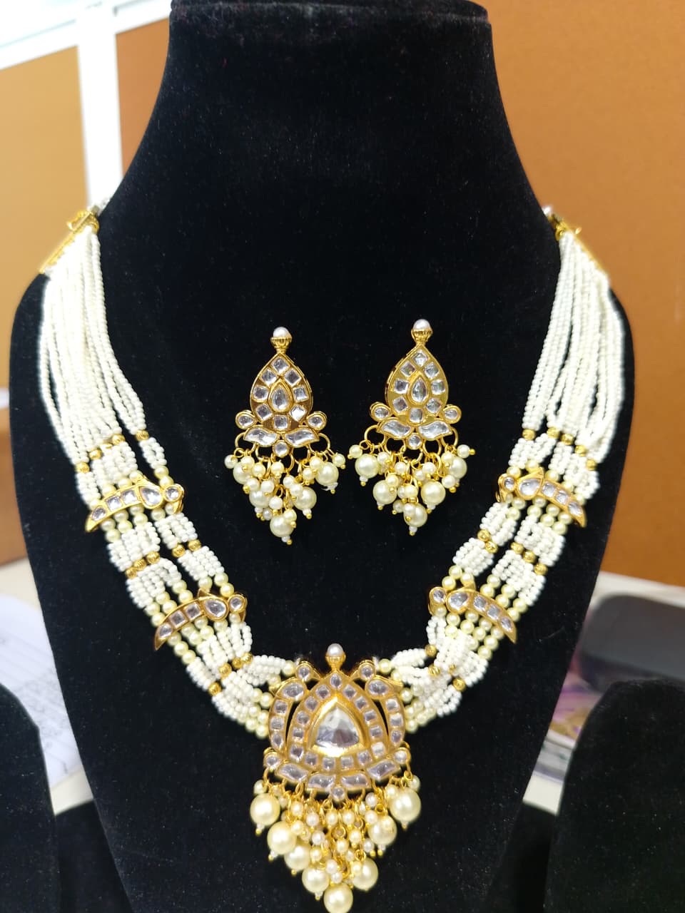 traditional Indian pearl and kundan necklace set with matching earrings - Image 2