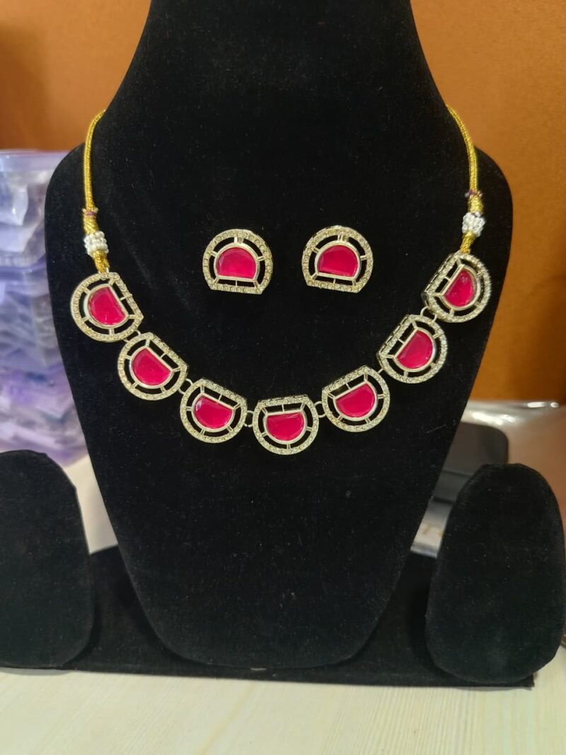 Kundan necklace with ruby-like red stones and matching earrings