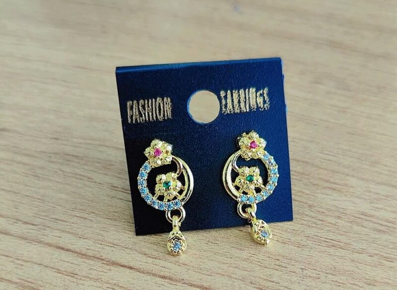 fashionable gold-plated earrings with red and clear stone embellishments,