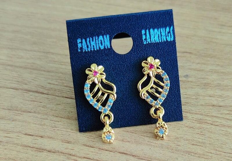 gold-plated fashion earrings featuring a leaf design with blue and pink stone embellishments and a floral stud top,