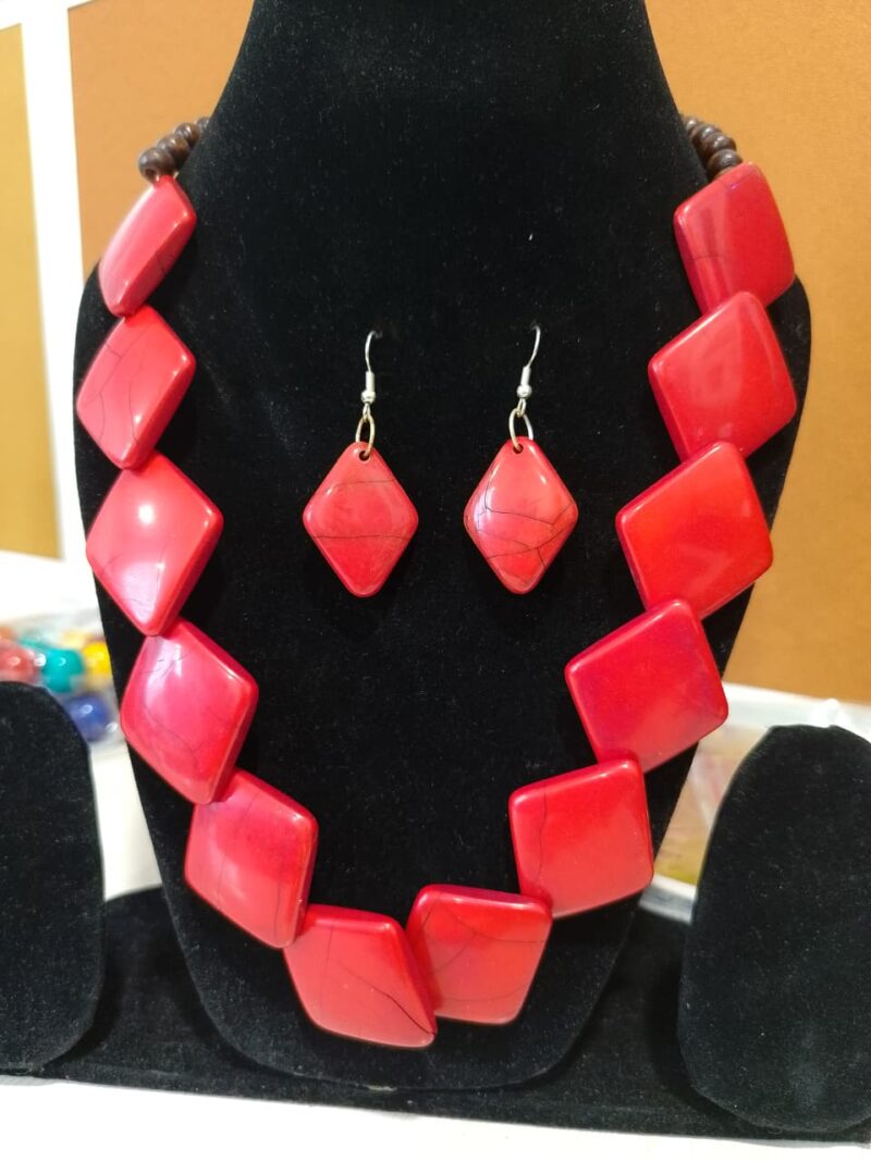 red necklace and earring set,