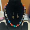 colorful beaded necklace and matching earrings set