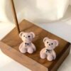76BTeddy earrings,