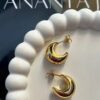 gold-toned crescent moon hoop earrings